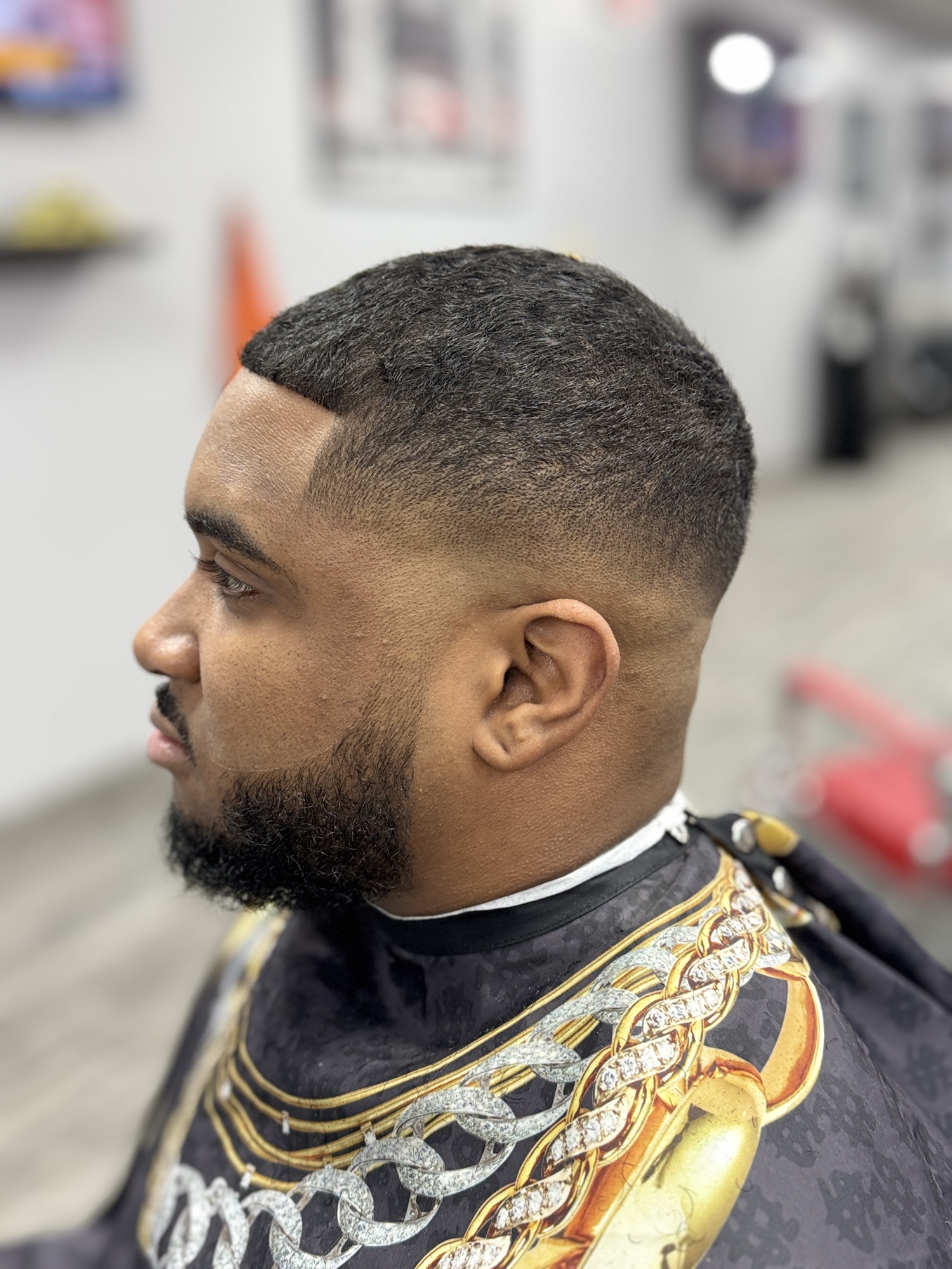 Skin fade with full beard at X Express Barbershop
